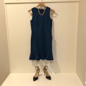 Blue, sleeveless dress, button accent pockets.  Excellent condition, worn once.